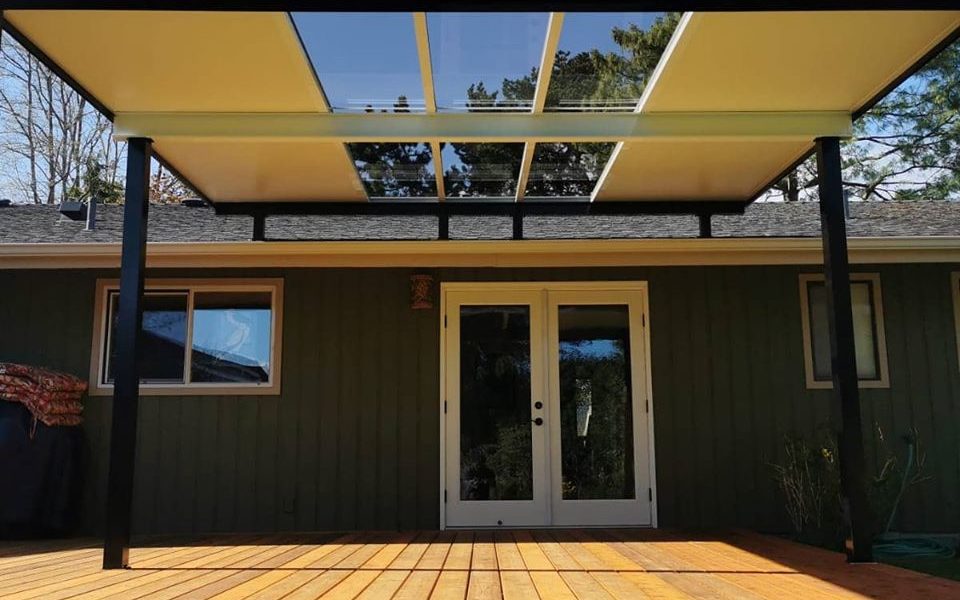 Patio cover with glass for light